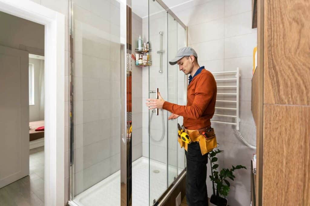Plumber installing a shower